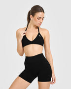 EnhanceLift™ Seamless Minimal Halter Neck Bralette with White Logo | Black