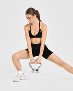 EnhanceLift™ Seamless Minimal Halter Neck Bralette with White Logo | Black