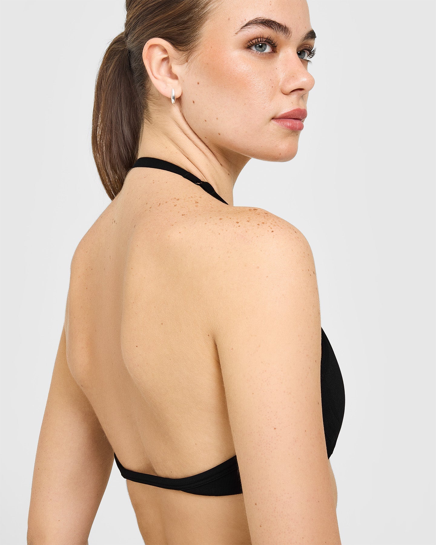 EnhanceLift™ Seamless Minimal Halter Neck Bralette with White Logo | Black