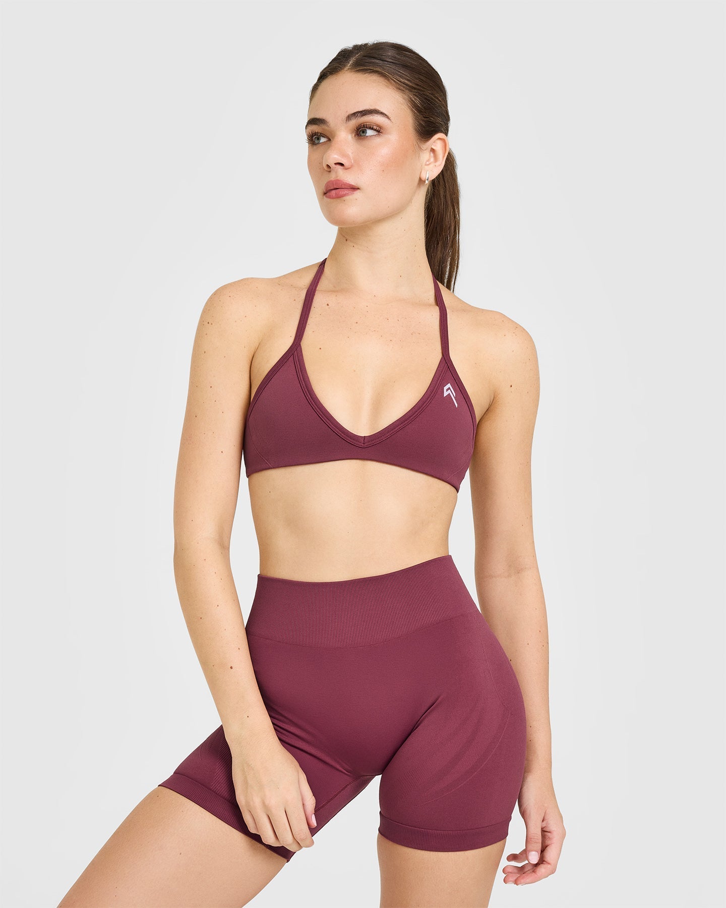 EnhanceLift™ Seamless Minimal Halter Neck Bralette with White Logo | Burnt Maroon