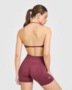 EnhanceLift™ Seamless Minimal Halter Neck Bralette with White Logo | Burnt Maroon