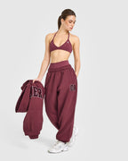 EnhanceLift™ Seamless Minimal Halter Neck Bralette with White Logo | Burnt Maroon