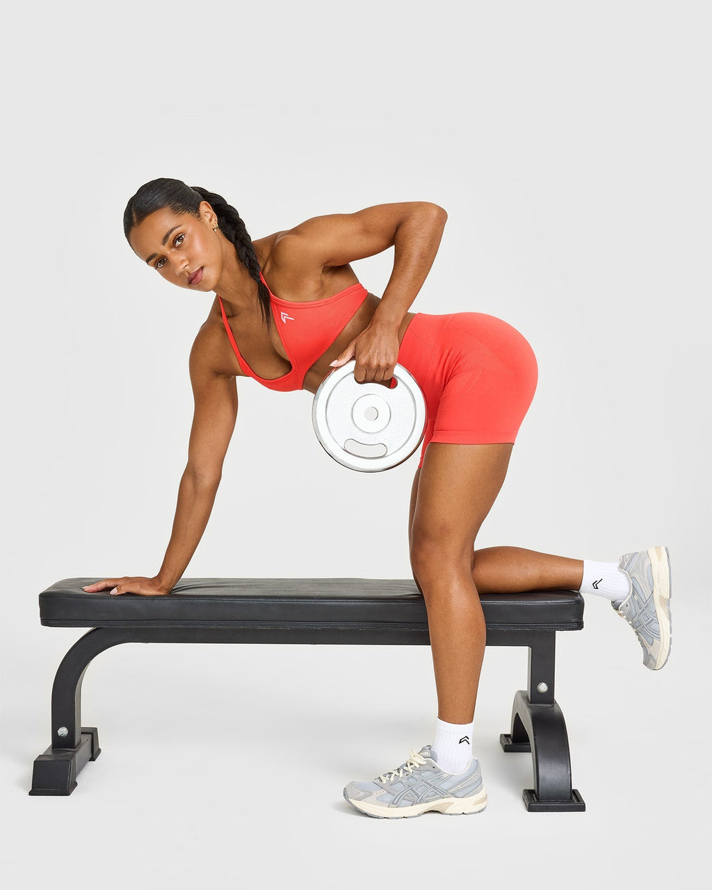 EnhanceLift™ Seamless Minimal Halter Neck Bralette with White Logo | Charged Coral