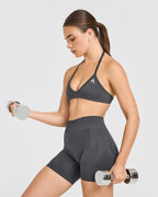 EnhanceLift™ Seamless Minimal Halter Neck Bralette with White Logo | Coal