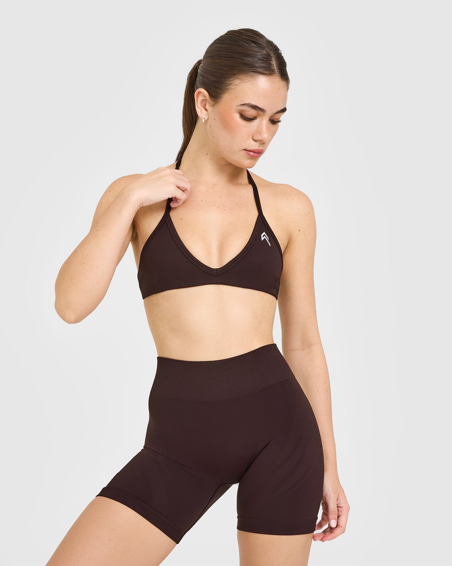 EnhanceLift™ Seamless Minimal Halter Neck Bralette with White Logo | Plum Brown