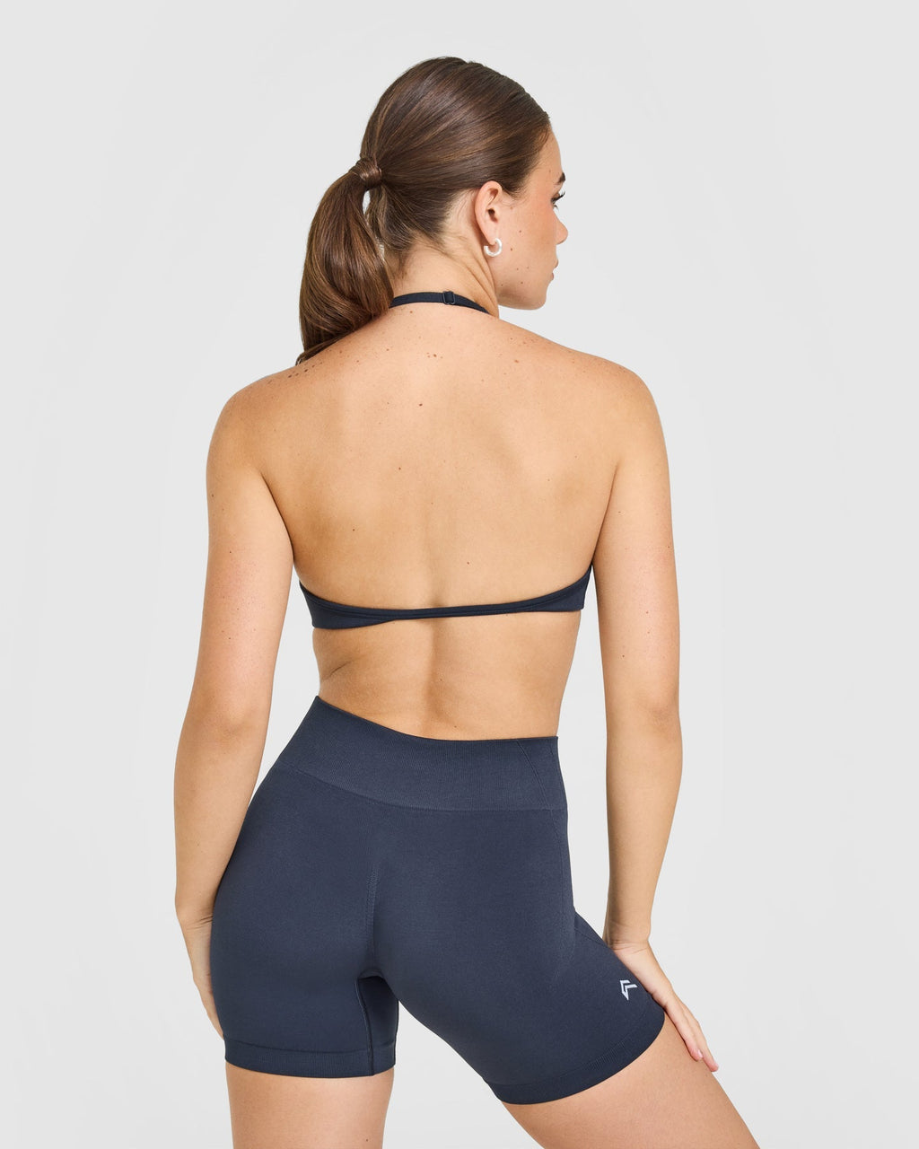 EnhanceLift™ Seamless Minimal Halter Neck Bralette with White Logo | True Blue