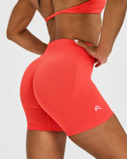 EnhanceLift™ Seamless Shorts with White Logo | Charged Coral