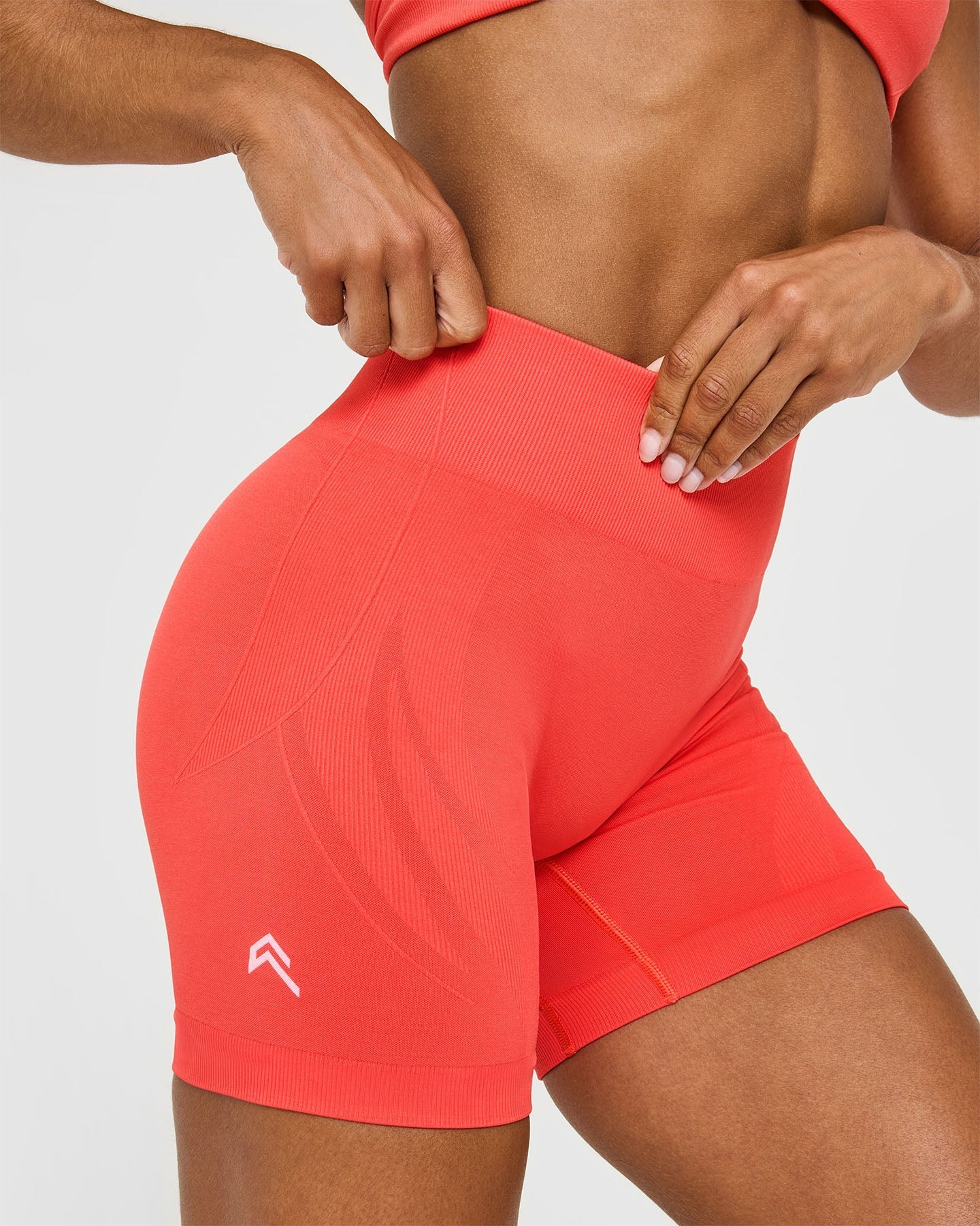 EnhanceLift™ Seamless Shorts with White Logo | Charged Coral
