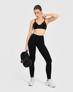 EnhanceLift™ Seamless Strappy Sports Bra with White Logo | Black