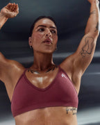 EnhanceLift™ Seamless Strappy Sports Bra with White Logo | Burnt Maroon