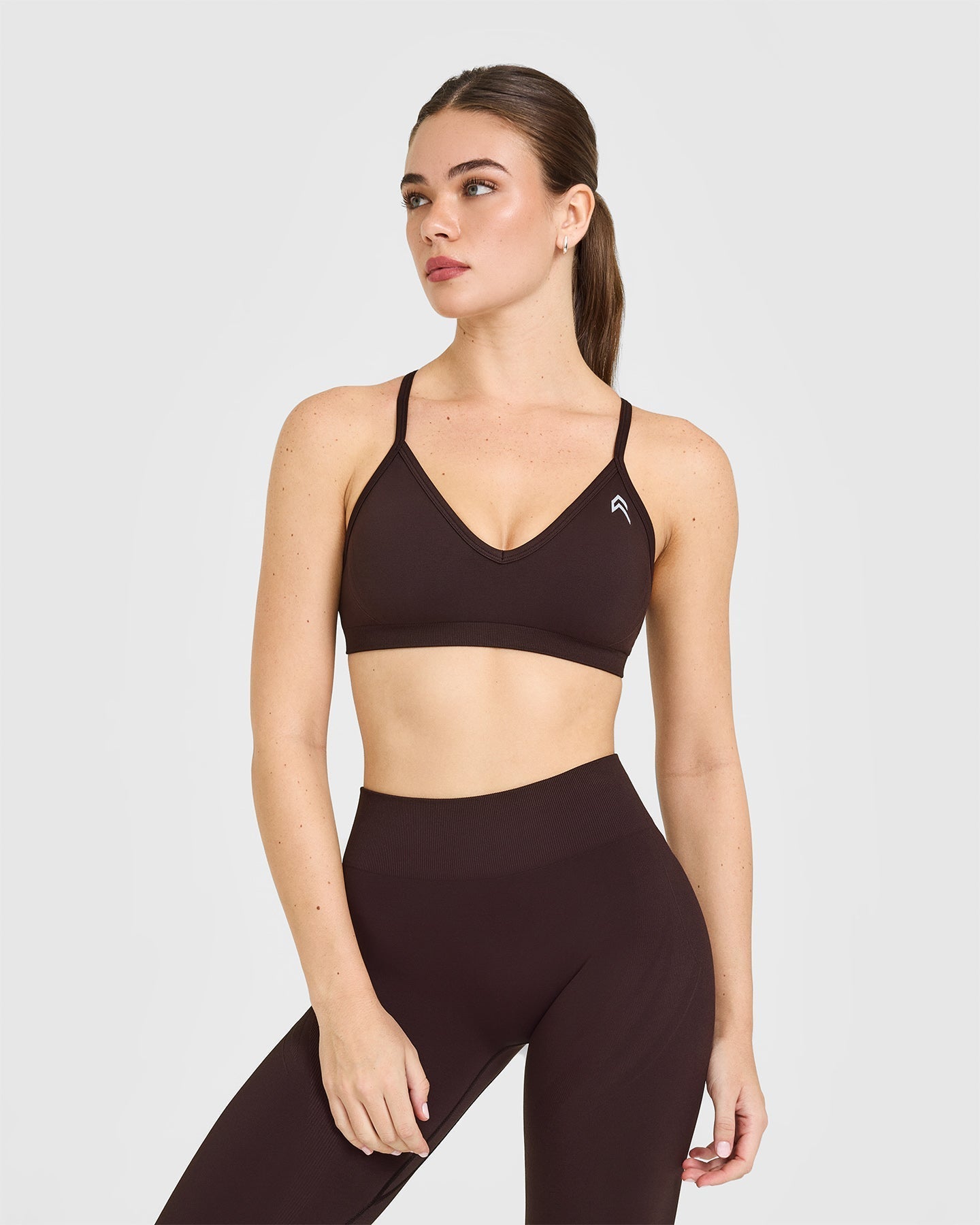 EnhanceLift™ Seamless Strappy Sports Bra with White Logo | Plum Brown