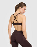 EnhanceLift™ Seamless Strappy Sports Bra with White Logo | Plum Brown