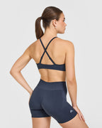 EnhanceLift™ Seamless Strappy Sports Bra with White Logo | True Blue