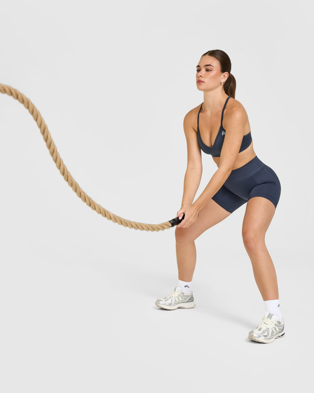 EnhanceLift™ Seamless Strappy Sports Bra with White Logo | True Blue