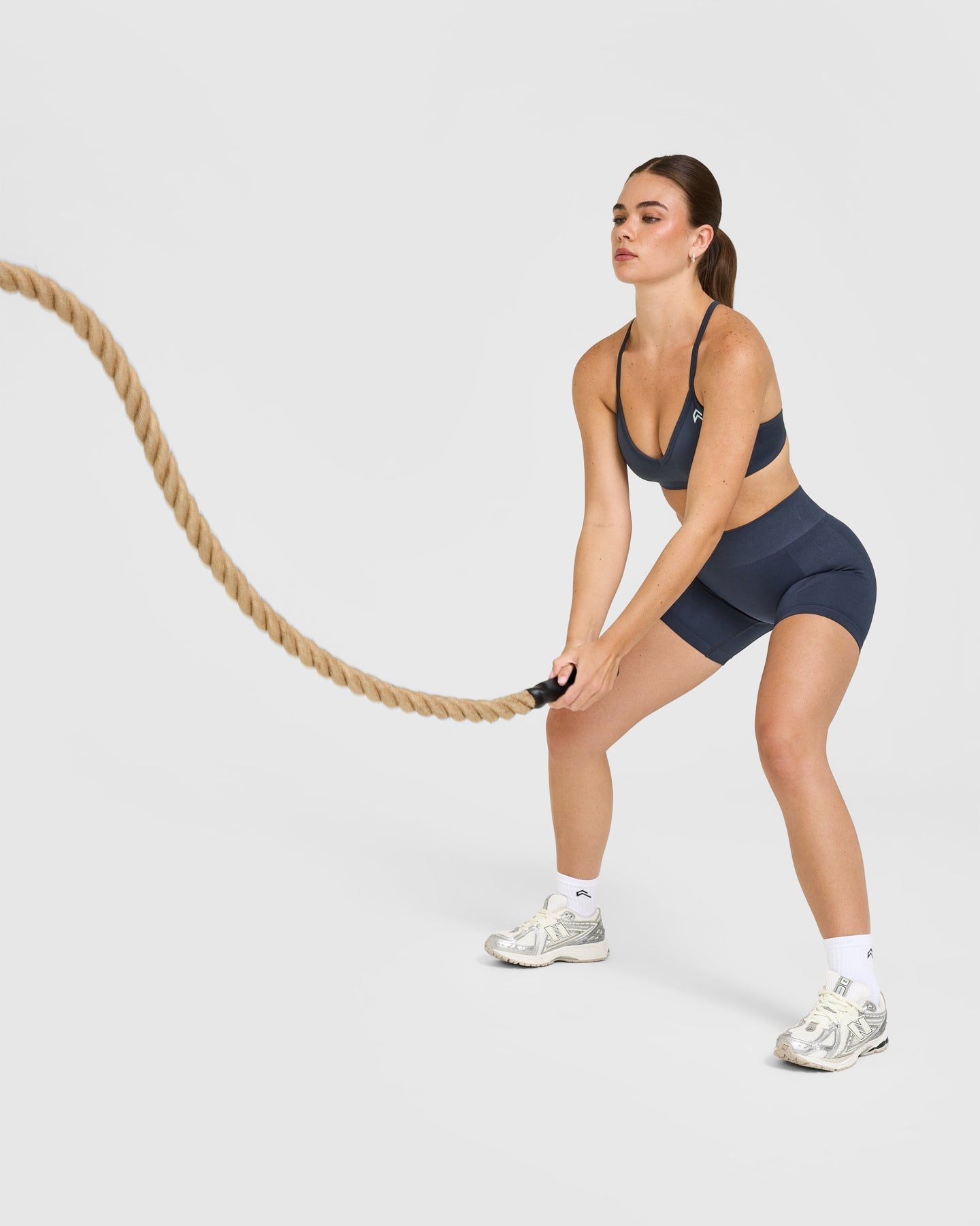 EnhanceLift™ Seamless Strappy Sports Bra with White Logo | True Blue