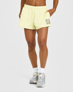 Foundations Oversized Oner 25 Shorts | Pastel Yellow