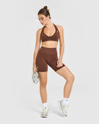 Effortless Seamless Halter Neck Sports Bra with White Logo | Rustic Brown
