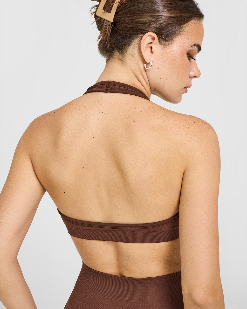 Effortless Seamless Halter Neck Sports Bra with White Logo | Rustic Brown