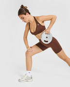 Effortless Seamless Halter Neck Sports Bra with White Logo | Rustic Brown