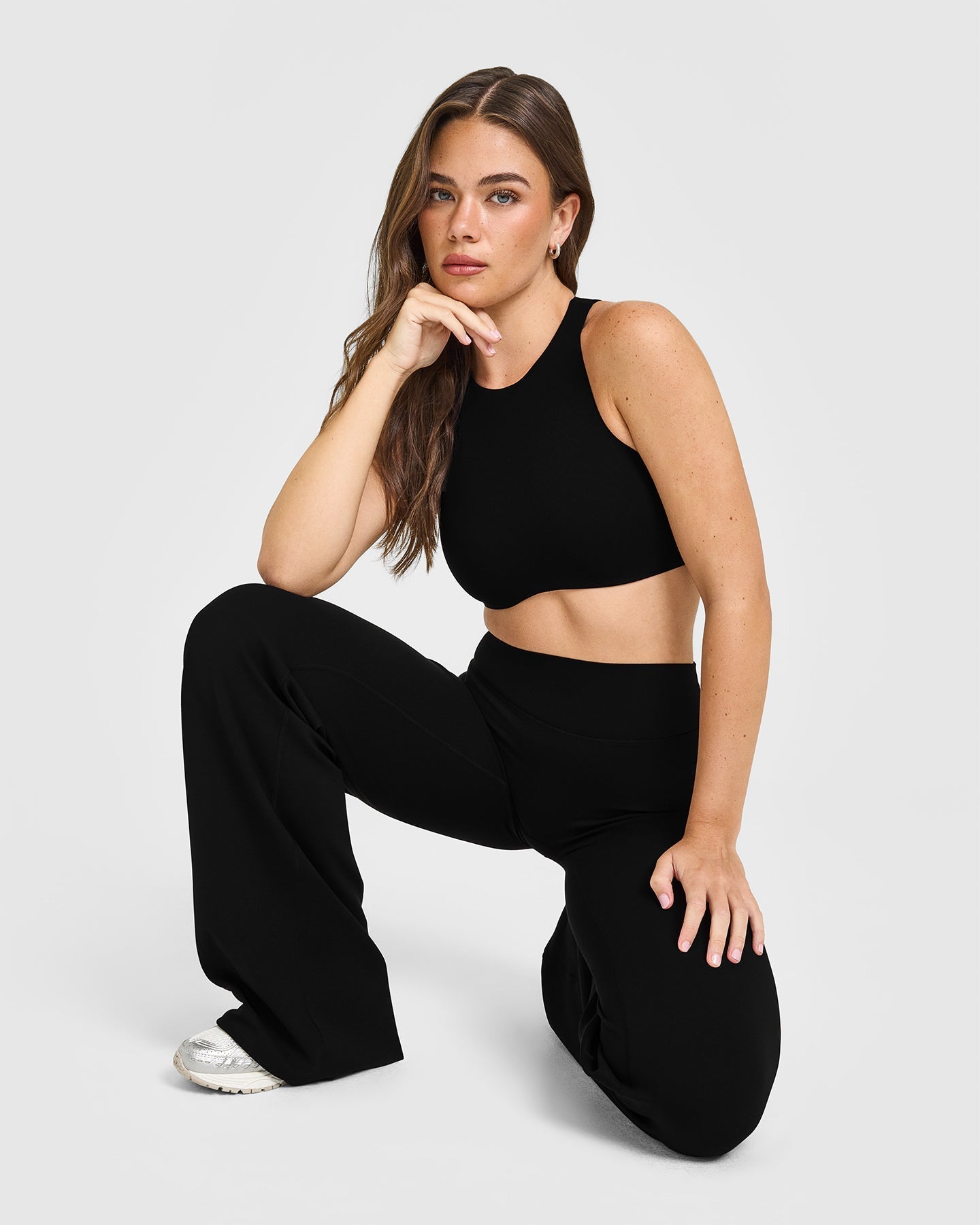 SoftMotion™ High Neck Sports Bra with White Logo | Black