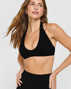 SoftMotion™ Minimal Halter Neck Bralette with White Logo | Black