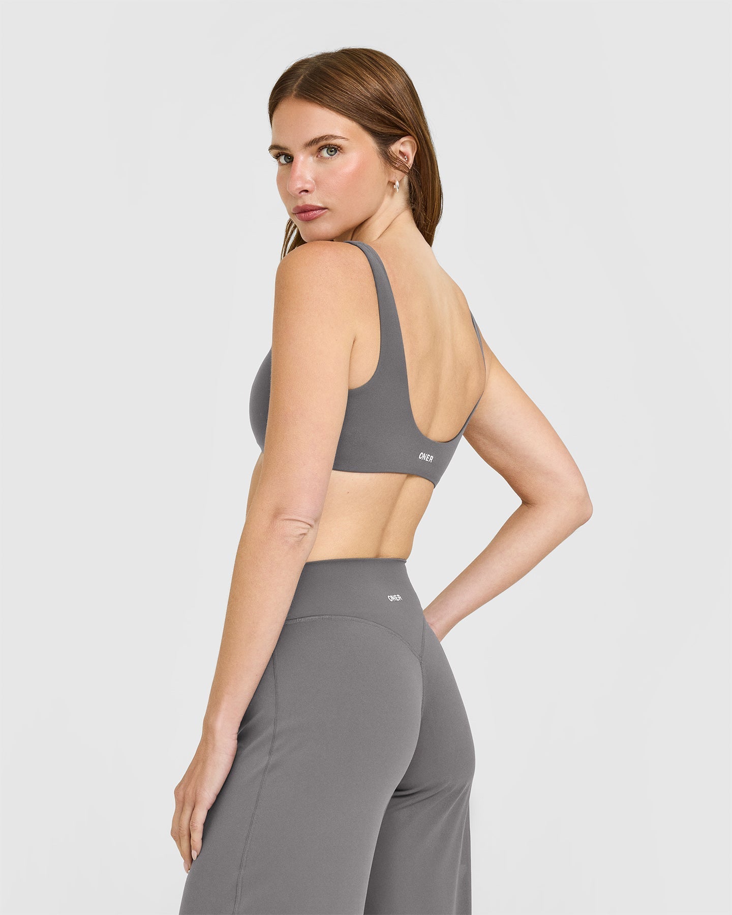 SoftMotion™ Scoop Back Bralette with White Logo | Ash Grey