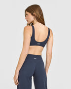 SoftMotion™ Scoop Back Bralette with White Logo | True Blue