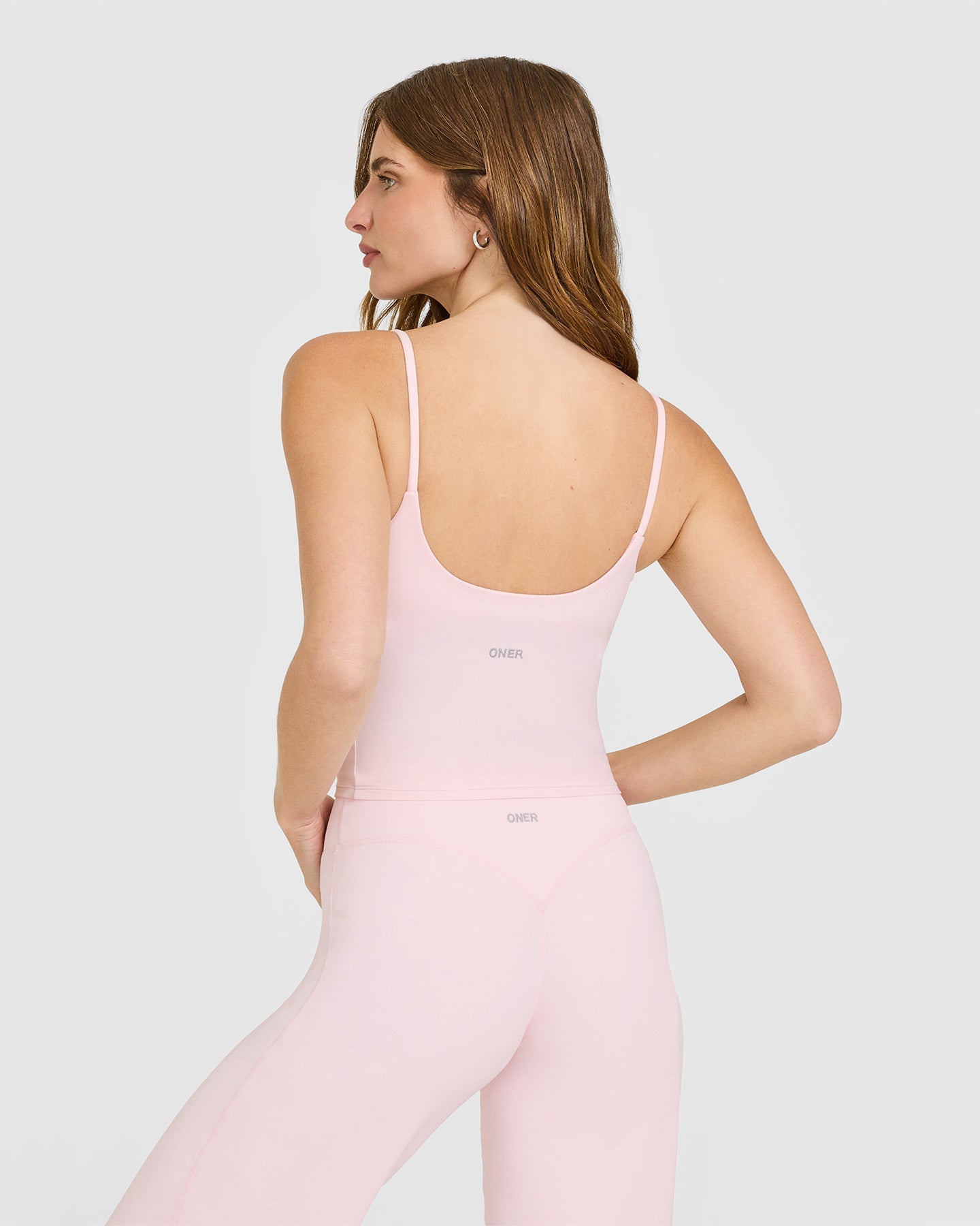 SoftMotion™ Strappy Mid Vest with Built in Bra Shelf with White Logo | Ballet Pink