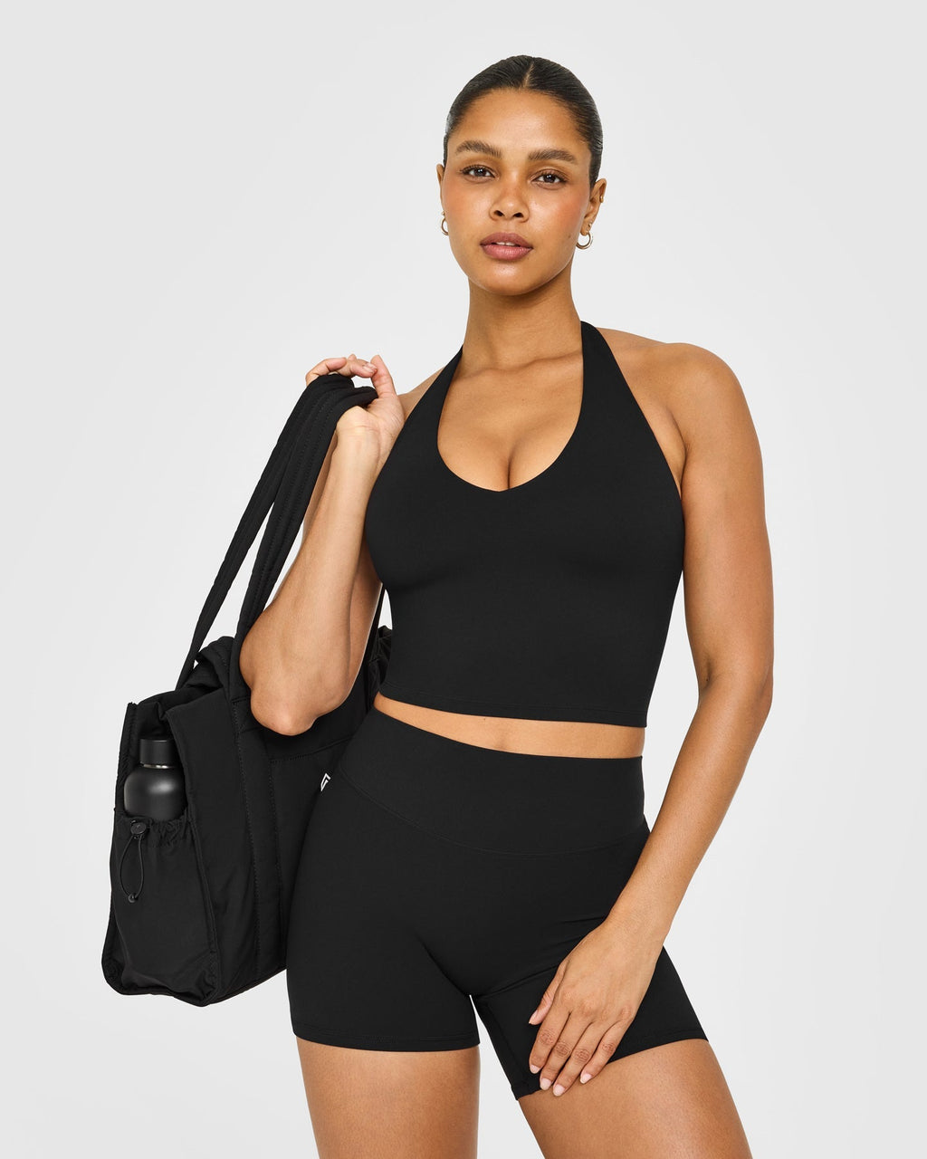 SoftMotion™ Halter Neck Mid Vest with Built in Bra Shelf with White Logo | Black