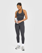 SoftMotion™ Halter Neck Mid Vest with Built in Bra Shelf with White Logo | Coal