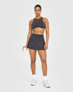 SoftMotion™ High Neck Sports Bra with White Logo | Coal