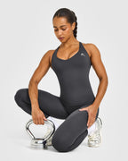 Unified V Neck Cross Back Vest White Logo | Coal