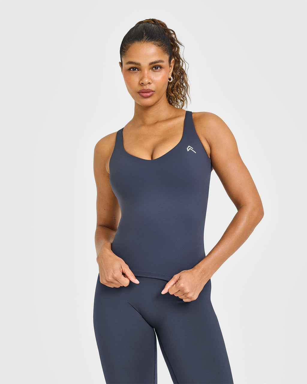 Unified V Neck Cross Back Vest White Logo | True Blue