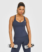 Unified V Neck Cross Back Vest White Logo | True Blue