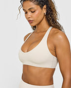 SoftMotion™ Bralette with White Logo | Sand
