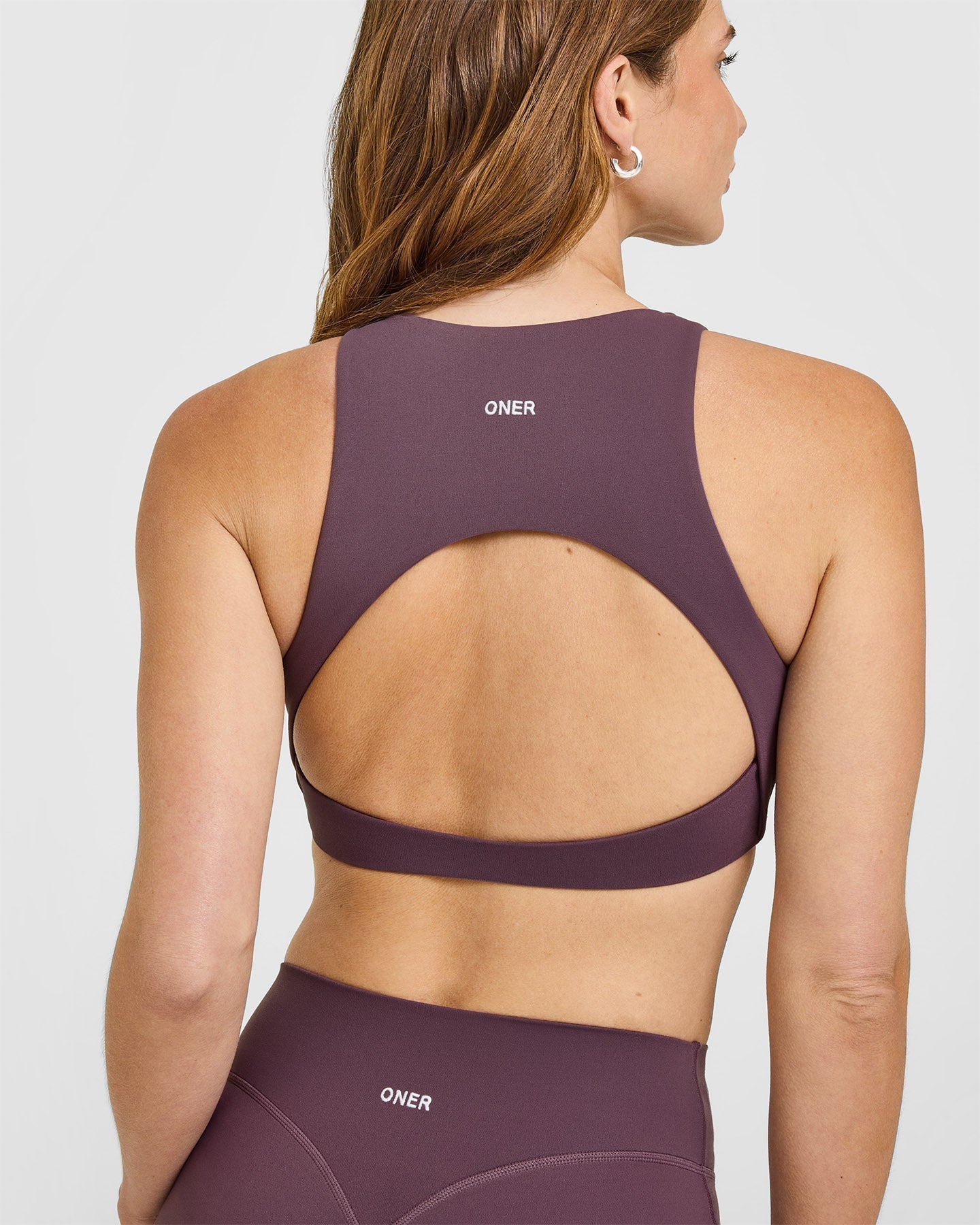 SoftMotion™ High Neck Sports Bra with White Logo | Vintage Purple