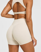 SoftMotion™ High Waisted Shorts 6" with White Logo | Sand