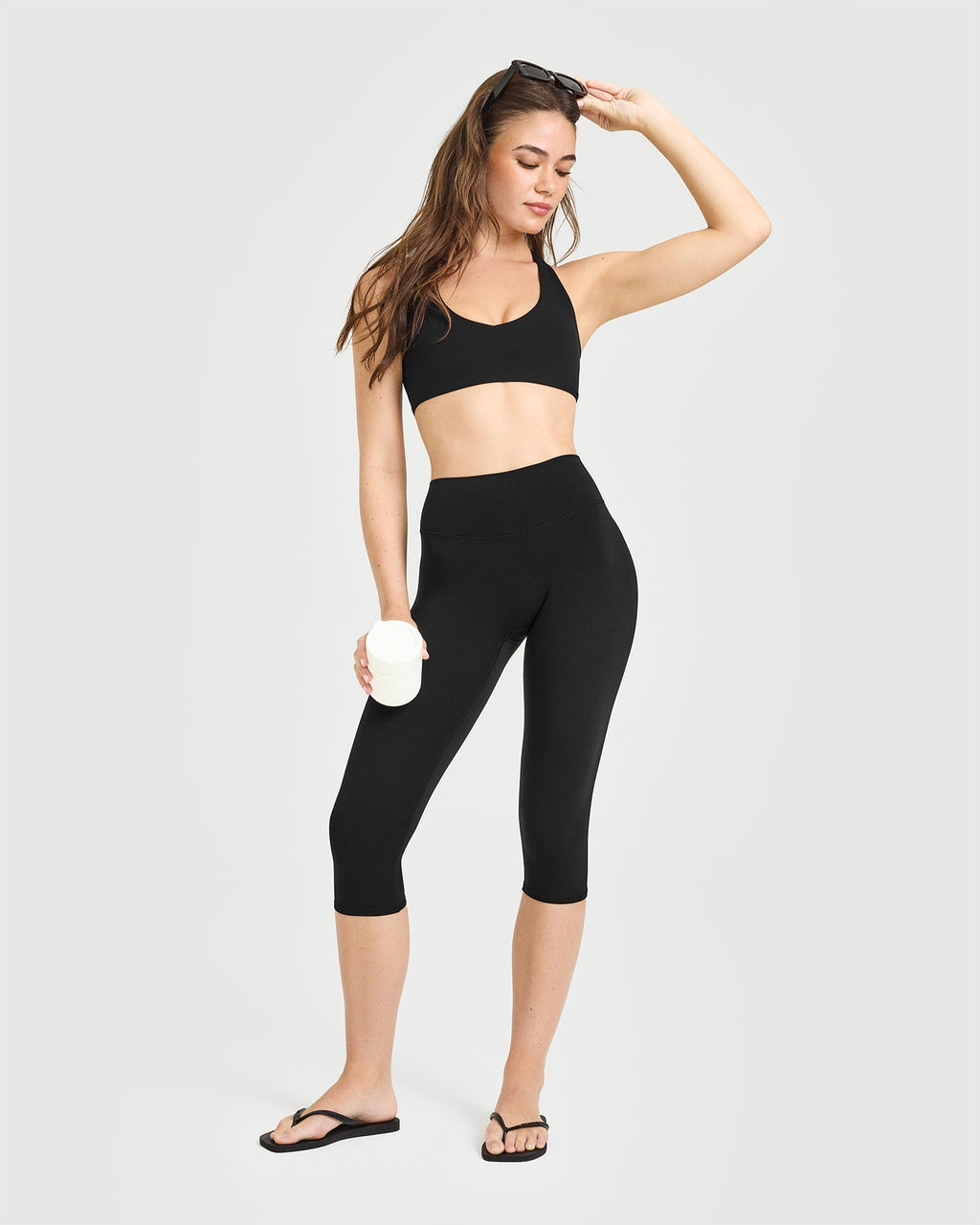 SoftMotion™ High Waisted Capri Leggings with White Logo | Black