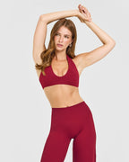 SoftMotion™ Minimal Halter Neck Bralette with White Logo | Ruby Red
