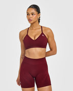 EnhanceLift™ Seamless Strappy Sports Bra with White Logo | Rosewood