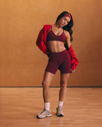 EnhanceLift™ Seamless Strappy Sports Bra with White Logo | Rosewood