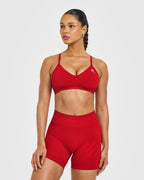 EnhanceLift™ Seamless Strappy Sports Bra with White Logo | Light Toasted Red