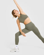 SoftMotion™ High Neck Sports Bra with White Logo | Alpine Green