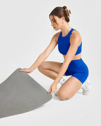 SoftMotion™ High Neck Sports Bra with White Logo | Light Cobalt Blue