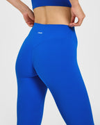 SoftMotion™ High Waisted Leggings with White Logo | Light Cobalt Blue