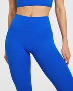 SoftMotion™ High Waisted Leggings with White Logo | Light Cobalt Blue