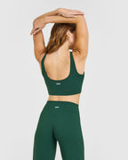 SoftMotion™ Longline Sports Bra with White Logo | Dark Racing Green