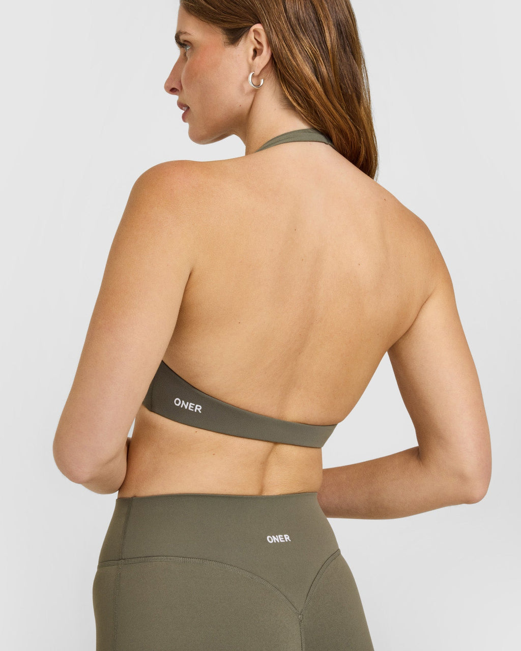 SoftMotion™ Minimal Halter Neck Bralette with White Logo | Alpine Green