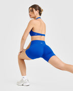 SoftMotion™ Minimal Halter Neck Bralette with White Logo | Light Cobalt Blue