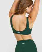 SoftMotion™ Scoop Back Bralette with White Logo | Dark Racing Green